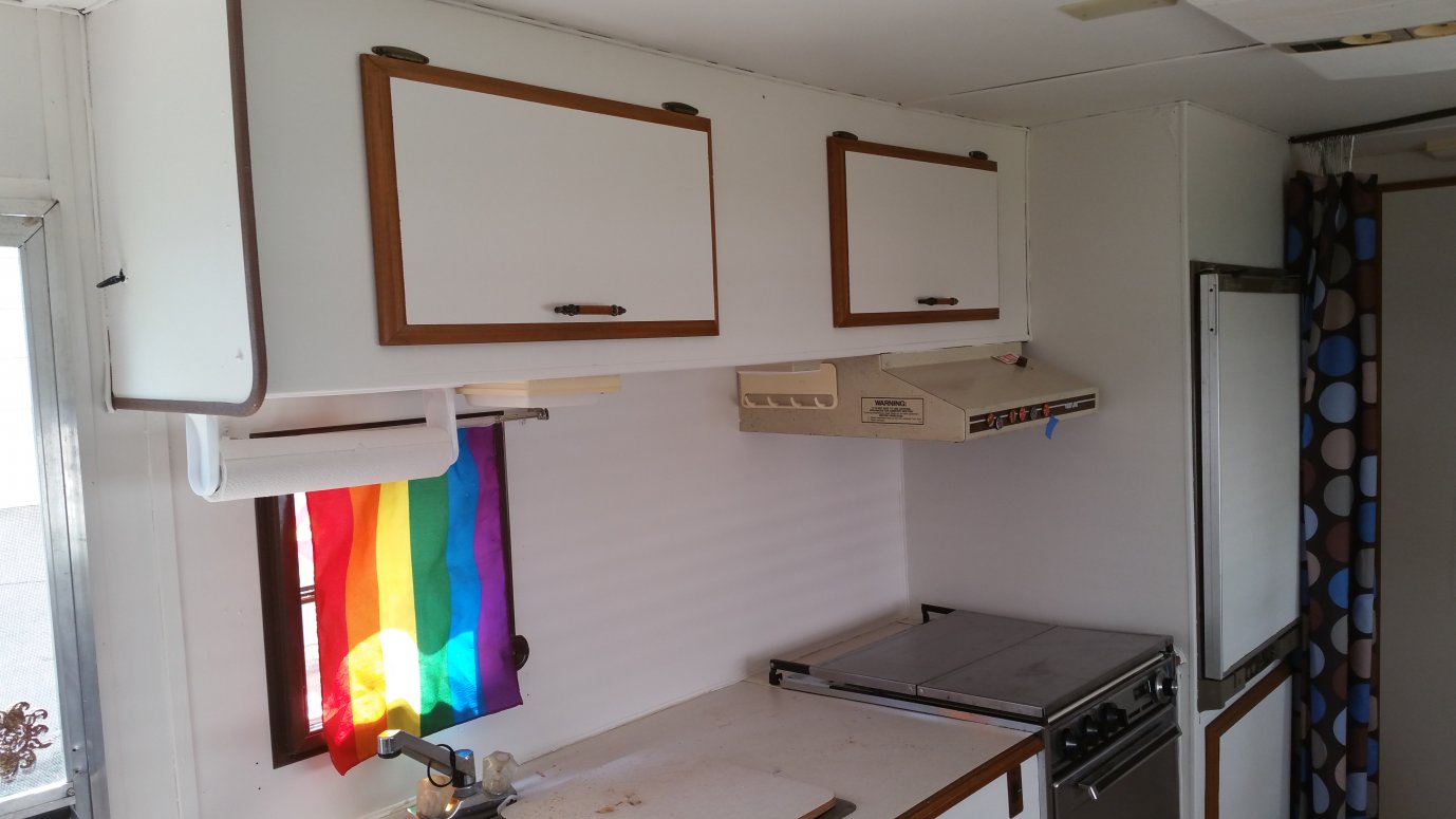 kitchen. hood, burners, oven and refrigerator all in perfect working order. Fridge works on electric or propane.