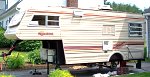 1984 Sunline F-1850 Fifth Wheel. Left Side, Undergoing Maintenance installing new brakes and new bearings. 
100 8597