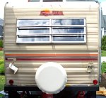 1984 Sunline F-1850 Fifth Wheel. Rear View, Undergoing Maintenance, installing new tail and clearance lights. 
100 8592