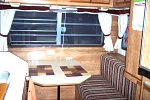 1984 Sunline F-1850 Fifth Wheel. Rearview showing dinette & Big windows. Newly installed Sony under cabinet AM/FM radio & CD player. 
100 9061