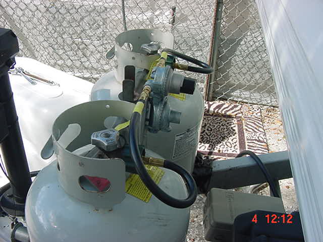 Side view of regulator showing hose routing.