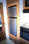 The owner replaced the Dometic with a simple 110 Magic Chef fridge