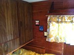 Interior with original cabinets, grandma made the curtains