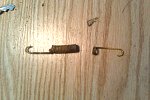 The broken adjuster spring I found when I pulled off the drum on the passanger side.