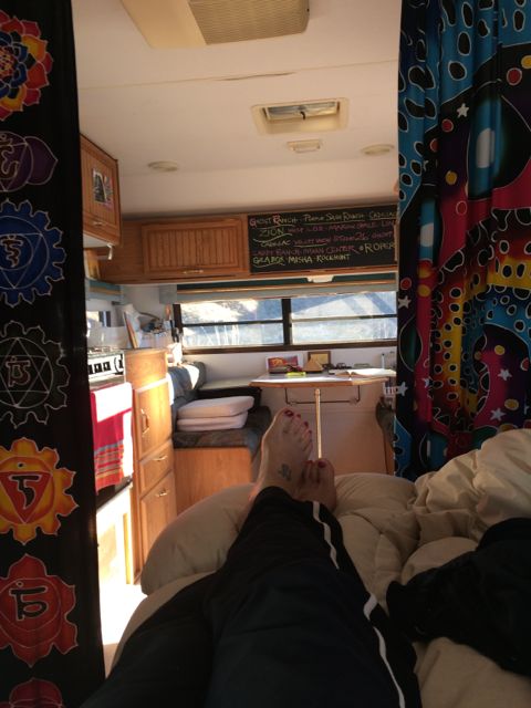 interior fabric and blackboard. I like colorful fabric and have hung a batik fabric instead of the dark green fabric that came with the camper.  I also added a chalkboard to my flop down bunk bed.
