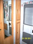 Bunk area Sunline built in draws it that long cabinet by door for the kids.