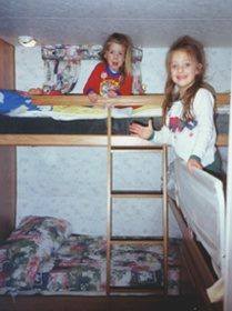 Amy and Carly in 1999 when we 1st got Sunline 2753 fresh from the factory. My girls were so proud of the special bunks Sunline made just for them. Sunline custom made the 2753 for us and for a small fee did bunks in place of queen size bed. This picture was on Sunline site and I just found it on the Sunline Facebook site that had all original pictures Sunline had on the company site. We loved this trailer!